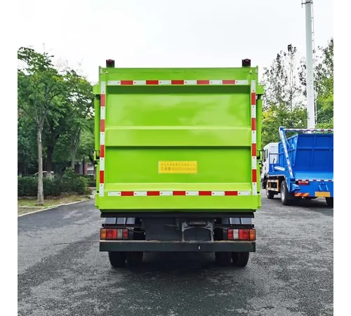 Autogunoier JMC de 5 metri cubi cu compactor și încărcare laterală