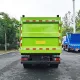 Autogunoier JMC de 5 metri cubi cu compactor și încărcare laterală