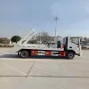 Autogunoieră cu braț oscilant (Skiploader)