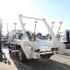 Camion de gunoi cu braț oscilant Howo 7CBM cu încărcător cu buncăr