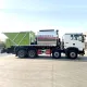 Camion de depozitare agregate sincronizate HOWO 8 * 4 pentru asfalt